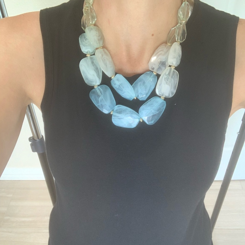 Necklace with blue light green and white beads